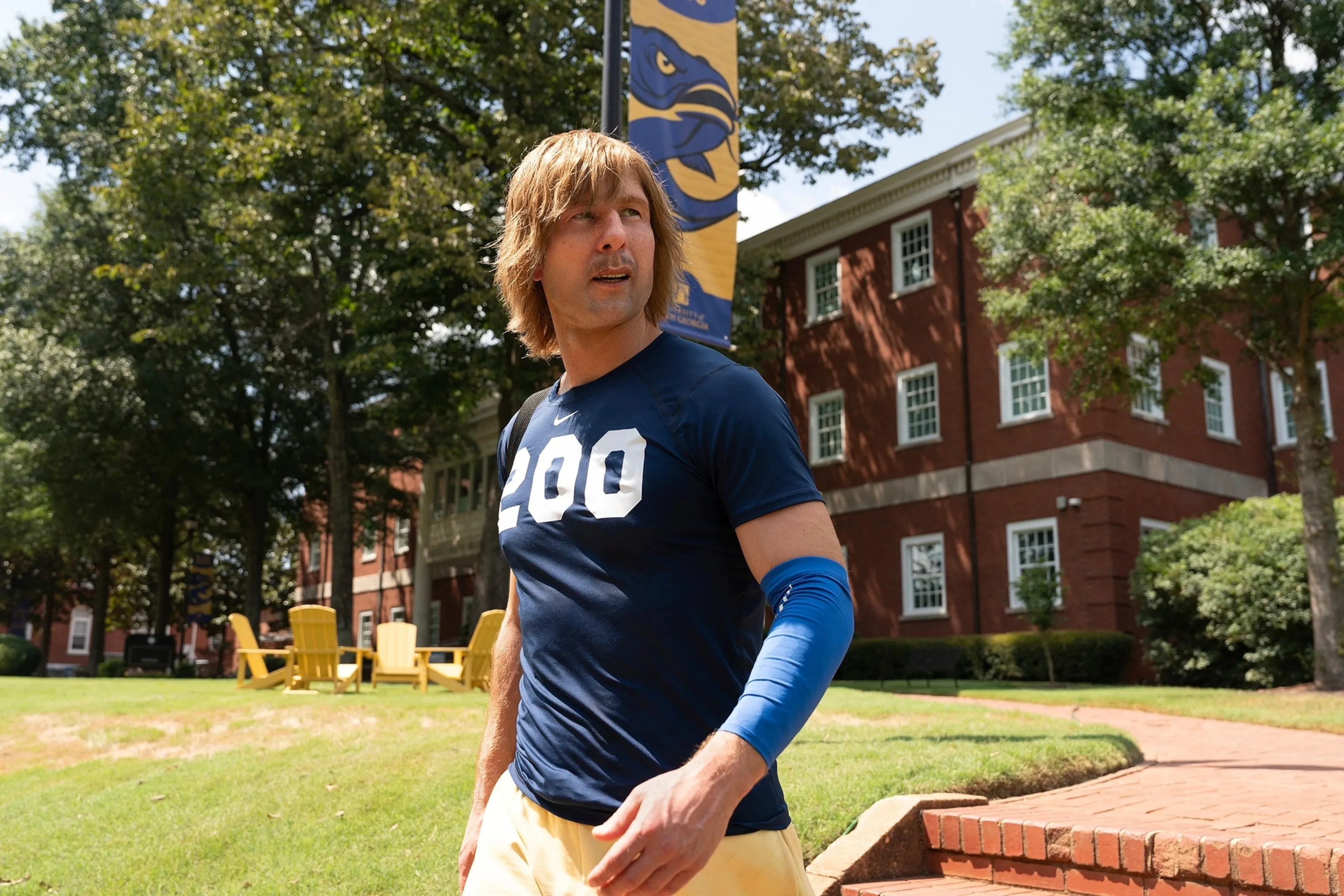 Glen Powell is a disguised college football player in 'Chad Powers' 1st look - ABC News