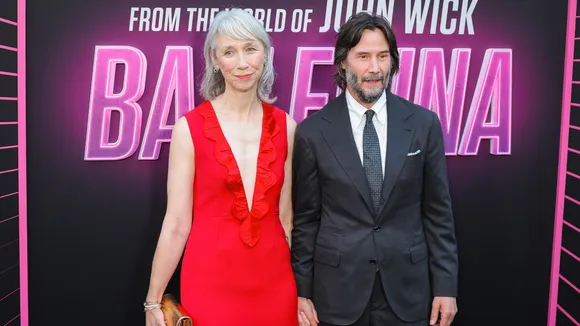 Keanu Reeves and Alexandra Grant Shine Holding Hands at 'Ballerina' Red Carpet Premiere